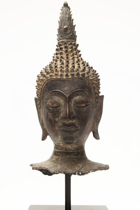 A bronze Buddha head from Thailand, 16th century.