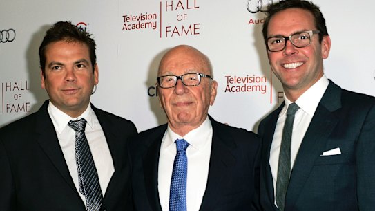 "We're going through this cathartic moment as an industry... and I think we [will] come out far stronger": Lachlan Murdoch with father Rupert and brother James.