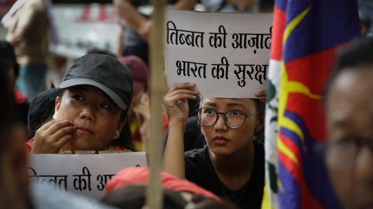 Exile Tibetans in New Delhi join a protest to show support for India in Doklam stand-off.