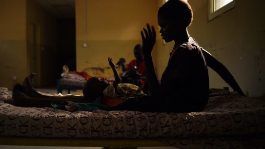 A 20-year-old South Sudanese woman with her baby at a hospital for displaced people in Bentiu, South Sudan.