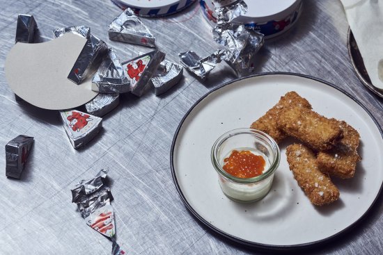 Chicken toast with Laughing Cow cheese and nuoc cham salmon caviar.