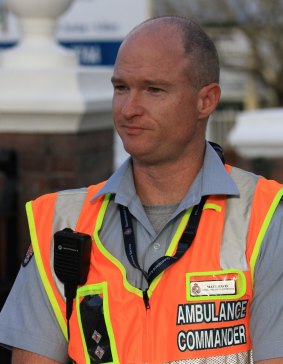 Queensland Ambulance Service acting operations supervisor Matthew Davis addresses the media.
