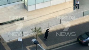 Police take aim at Farhad Jabar after he killed Curtis Cheng outside Parramatta police headquarters.