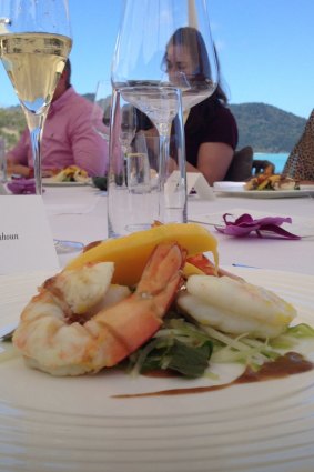 Mangan's entree of king prawns with mango, papaya and tamarind dressing, which will be served to business class diners.