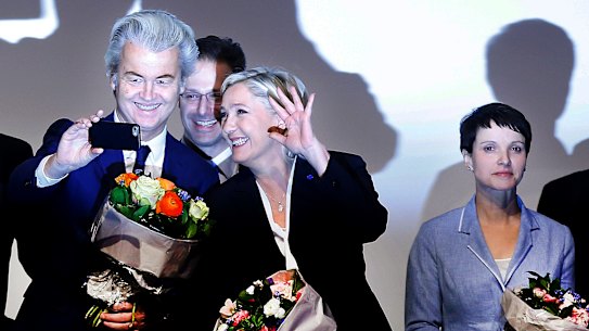 Dutch Freedom Party leader Geert Wilders, left, and French presidential candidate Marine Le Pen enjoy a selfie with Marcus Pretzell while his wife, Alternative for Germany leader Frauke Petry, stands to one side after a summit of European far-right leaders in Koblenz.