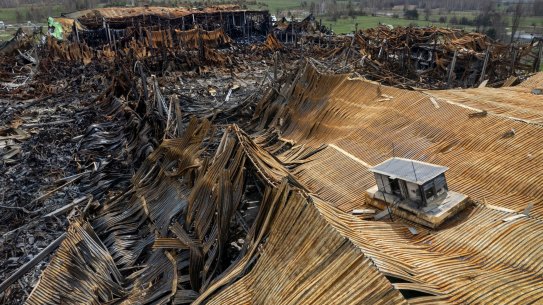 MAKARIV, UKRAINE - APRIL 19: (EDITORS NOTE: This photograph was taken using a drone) As seen from the air, the massive Komodor logistics park lies in ruins, after being bombed and burnt during the Russian invasion on April 19, 2022 near Makariv, Ukraine. The attack in early March destroyed some $50 million of medicines and medical raw materials for Ukrainian pharmaceutical company Farmac, according to Forbes. Losses for other tenants of the 400,000 square meter facility are yet unknown. (Photo by John Moore/Getty Images) *** BESTPIX ***