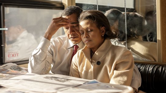 On primary morning in New Hampshire in January 2008, the Obamas find a rare moment of quiet together on an election bus after campaigning separately all week. 