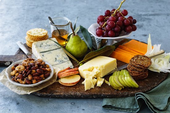 Create different heights to make a cheese plate look appealing.