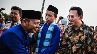 Ahok, right, in 2014. A Christian and ethnic Chinese, he became governor after his predecessor and political ally Joko Widodo was elected President of Indonesia.