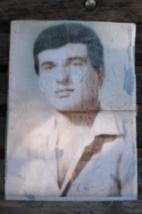 A faded photograph of Milad Youssef, whose family believe he was imprisoned in Syria.