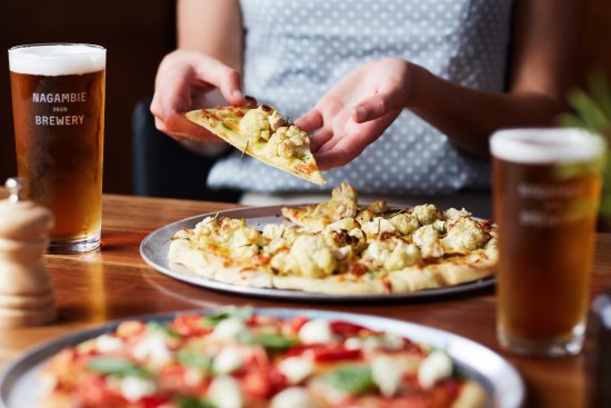 Wood-fired pizzas and house brews are on the menu at Nagambie Brewery and Distillery.