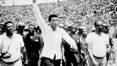 Ali in a scene from <i>When We Were Kings</i>, the documentary of the "rumble in the jungle' with George Foreman.