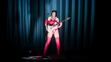 St. Vincent at Carriageworks. A red rubber leotard didn't seem  quite enough to keep warm in the  cavernous, chilly shed.