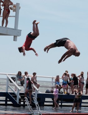 Taking the plunge at Eastern Beach.