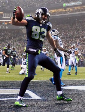 Luke Willson of the Seattle Seahawks celebrates after scoring a touchdown in the fourth quarter against the Carolina Panthers.