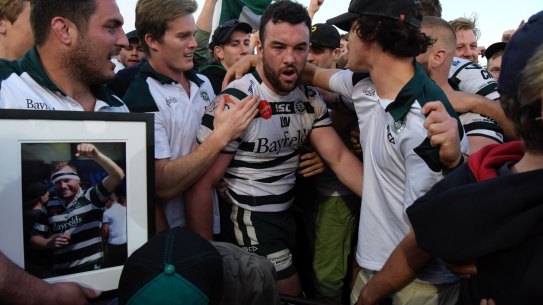 Emotional: Warringah remember Lachlan Ward after winning the Shute Shield.