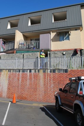 Police outside the Cheriton Street complex.