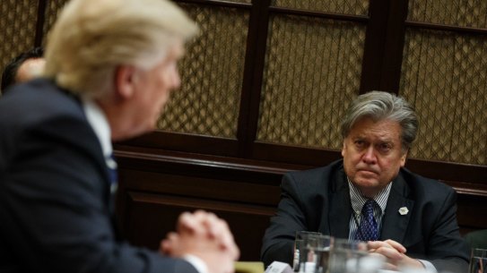 Hero to zero: Former White House chief strategist Steve Bannon listens as President Donald Trump speaks.