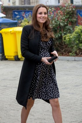 Cheap chic: The Duchess of Cambridge visits the Brookhill Children's Centre in Woolwich wearing an ASOS dress.