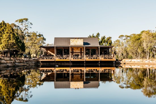Waterside dining: The sandstone homestead is perched on a dam. 