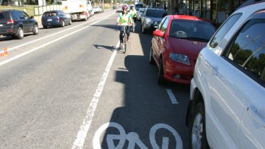 The cyclists are believed to be protesting against unseparated bike paths, such as this one, which are between parked cars and the main road.  