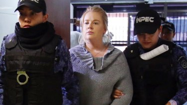 Cassandra Sainsbury arrives for a court hearing in Bogota.