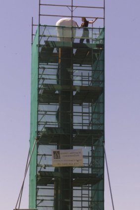 Scaffolding errected around the matchstick sculpture for repairs.