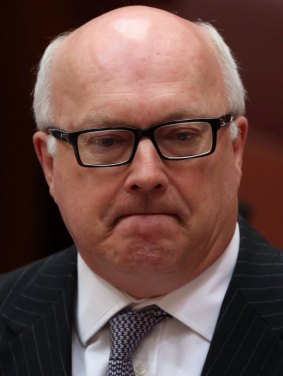 Attorney-General George Brandis says police formed a judgment that the arrest of the men was necessary. 