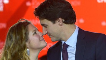 Liberal leader Justin Trudeau stands with his wife Sophie Gregoire at the Liberal party headquarters in Montreal on Tuesday.