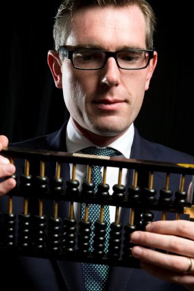 NSW Treasurer Dominic Perrottet with an abacas that Gladys Berejiklian gave him when he took the job, in Sydney. 28th April 2017 Photo: Janie Barrett