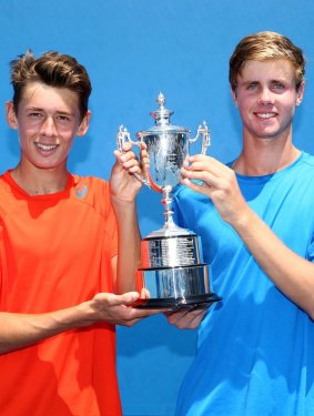 Alex De Minaur and Blake Ellis with the spoils of victory.