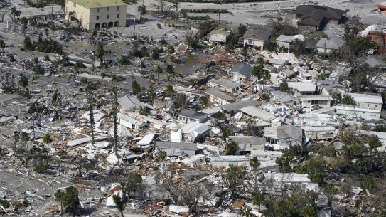 Damaged homes and debris are shown in the aftermath of Hurricane Ian, Thursday, Sept. 29, 2022, in Fort Myers, Fla. (AP Photo/Wilfredo Lee)