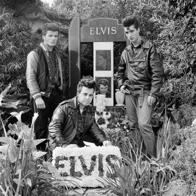 Three young men with floral tribute on the 14th anniversary of Elvis's death. Elvis Memorial Melbourne 1991, from the series Elvis Immortal.