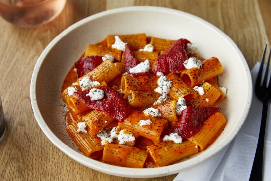 Go-to dish: Rigatoni with fermented chilli, piquillo peppers, black lime and marinated goat's cheese.