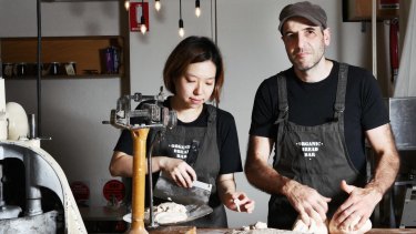 457 visa worker Yuhwa Kim from South Korea and bakery owner Andreas Rost.