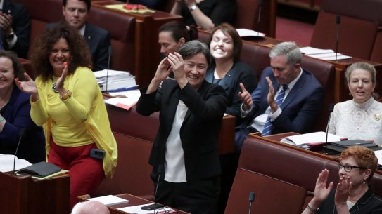 Labor's Penny Wong claps after the same-sex marriage bill passed the Senate on Wednesday.