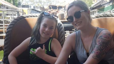The family of Shannon Molloy, pictured when they were stranded on the Thunder River Rapids ride on the same day as the fatal Dreamworld accident.