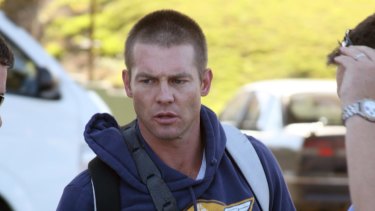 Ben Cousins is shown on CCTV trying to outrun police. 
