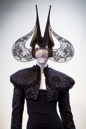 Lace Wings Hat by Philip Treacy, 2001, jacket by Alexander McQueen 2002, dress by Alexander McQueen, 2003 on display at the Isabella Blow: A Fashionable Life exhibition.