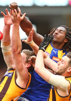 Nic Naitanui of the Eagles soar high.