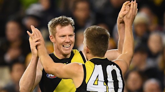 Tails up: Richmond's Jack Riewoldt and Dan Butler.