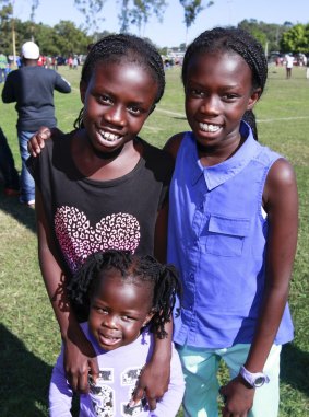 Aboul, Aleak and Yar Juaj  who were born in Sudan but now call Goodna home.