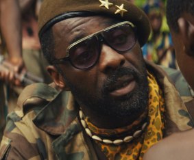 Idris Elba and Abraham Attah (right) in Beasts of No Nation.