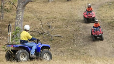 A coroner recommends children be banned from riding adult-sized quad bikes in Queensland.