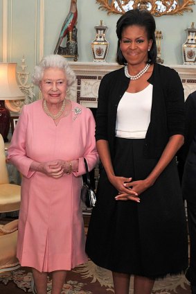 To meet the Queen, 2009. "You don't go to Buckingham Palace in a sweater," griped Oscar de la Renta. Wrong. Suddenly the humble cardie was deemed chic.