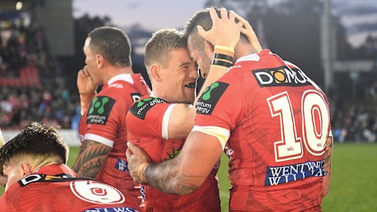 One for true believers: Matt Dufty enjoys victory after a tight contest in challenging conditions.