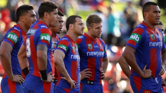 NCH SPORT
NRL action at Hunter Stadium, Broadmeadow. Round 23. Newcastle Knights VS Penrith Panthers. Picture shows Knights players dejected at full time, Jarrod Mullen, centre. 
14th August 2016 Newcastle
NCH SPORT PIC JONATHAN CARROLL