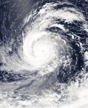 Soudelor snapped from space as it reaches category 5 strength.