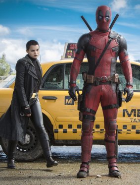 Morena Baccarin and Ryan Reynolds in <i>Deadpool</i>.