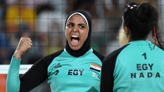 Doaa Elghobashy, of Egypt, celebrates during the women's beach volleyball pool match against Germany.